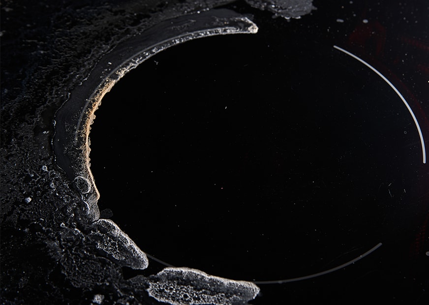 burnt crusted build up on glass stovetop