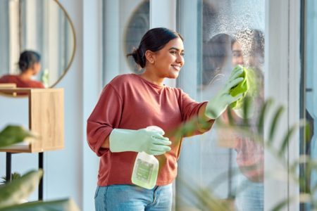 woman cleaning with ecofriendly cleaning solution