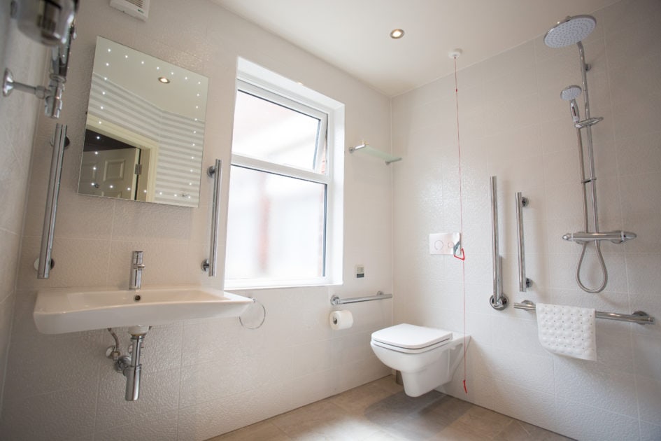 simple bathroom, with a window for better ventilatioon